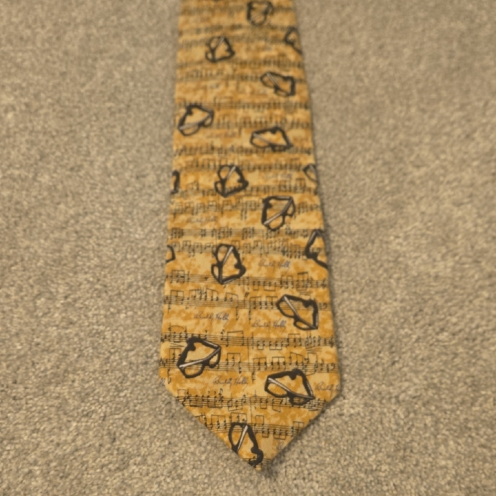 Buddy Holly Center Silk Tie Tan With Muiscal Pattern With Glasses